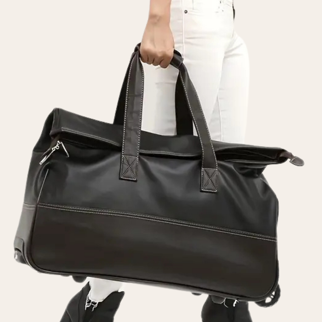 Grand sac de voyage sur roulettes en cuir.