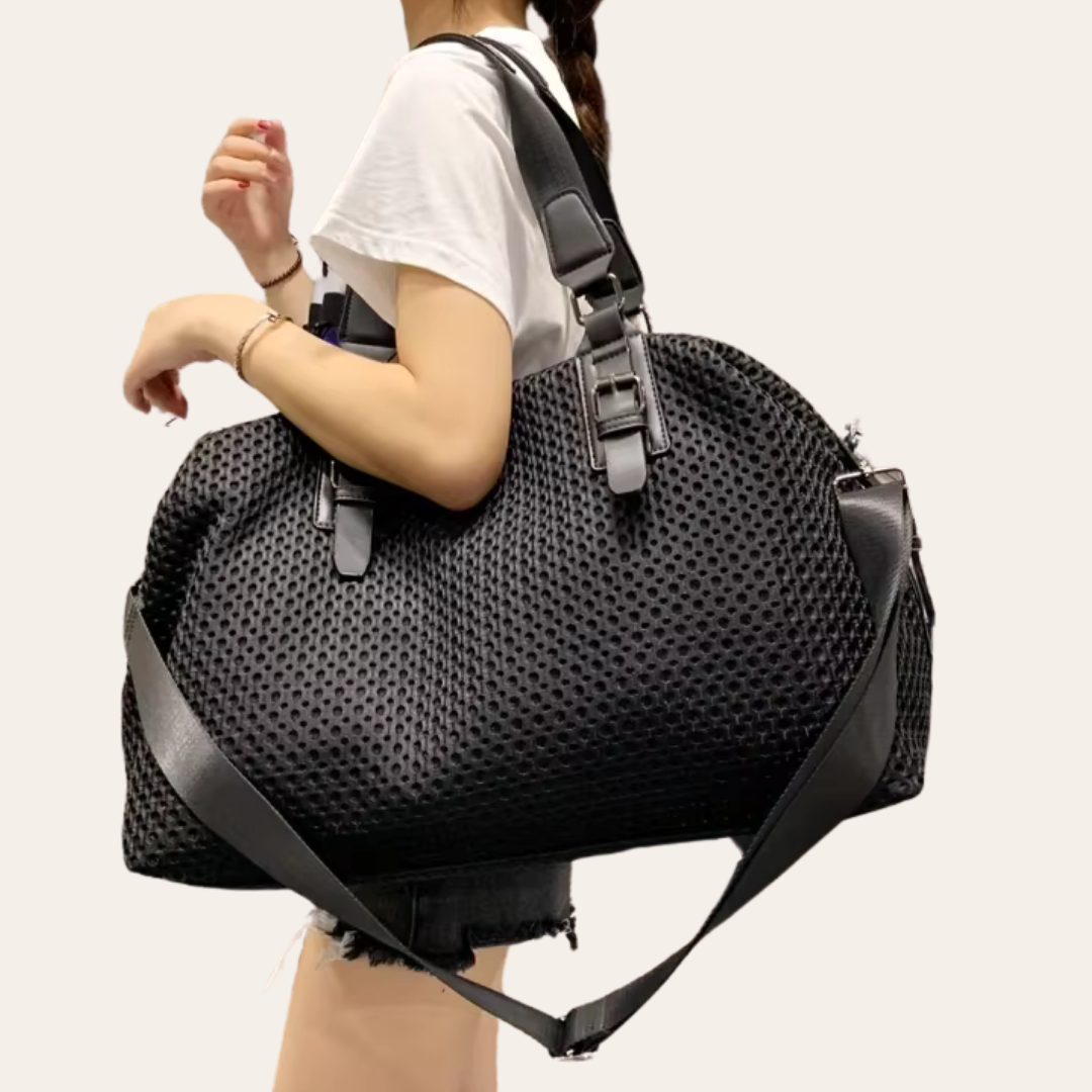 Grand sac a main femme noir cabine week end.