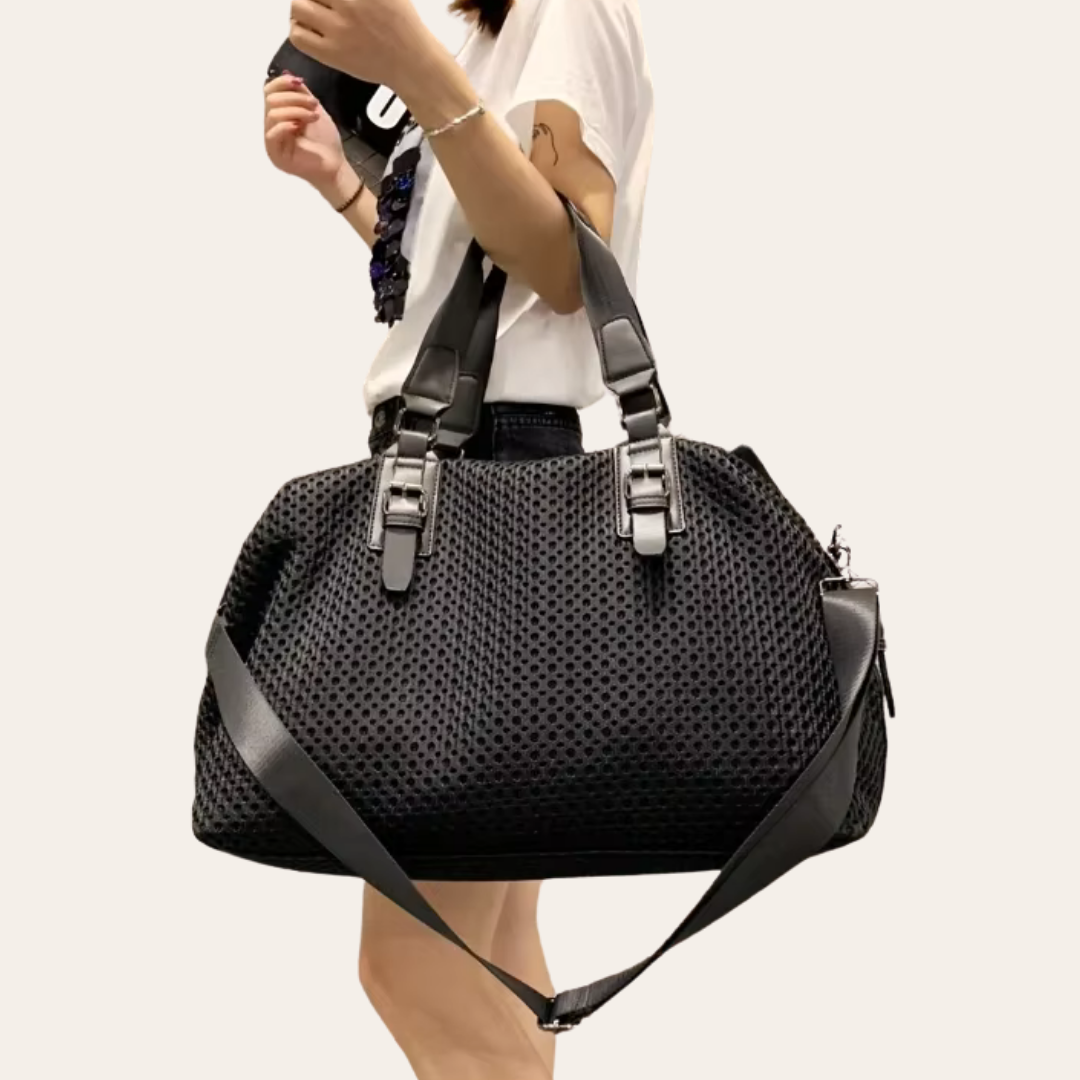Grand sac a main femme noir cabine week end.