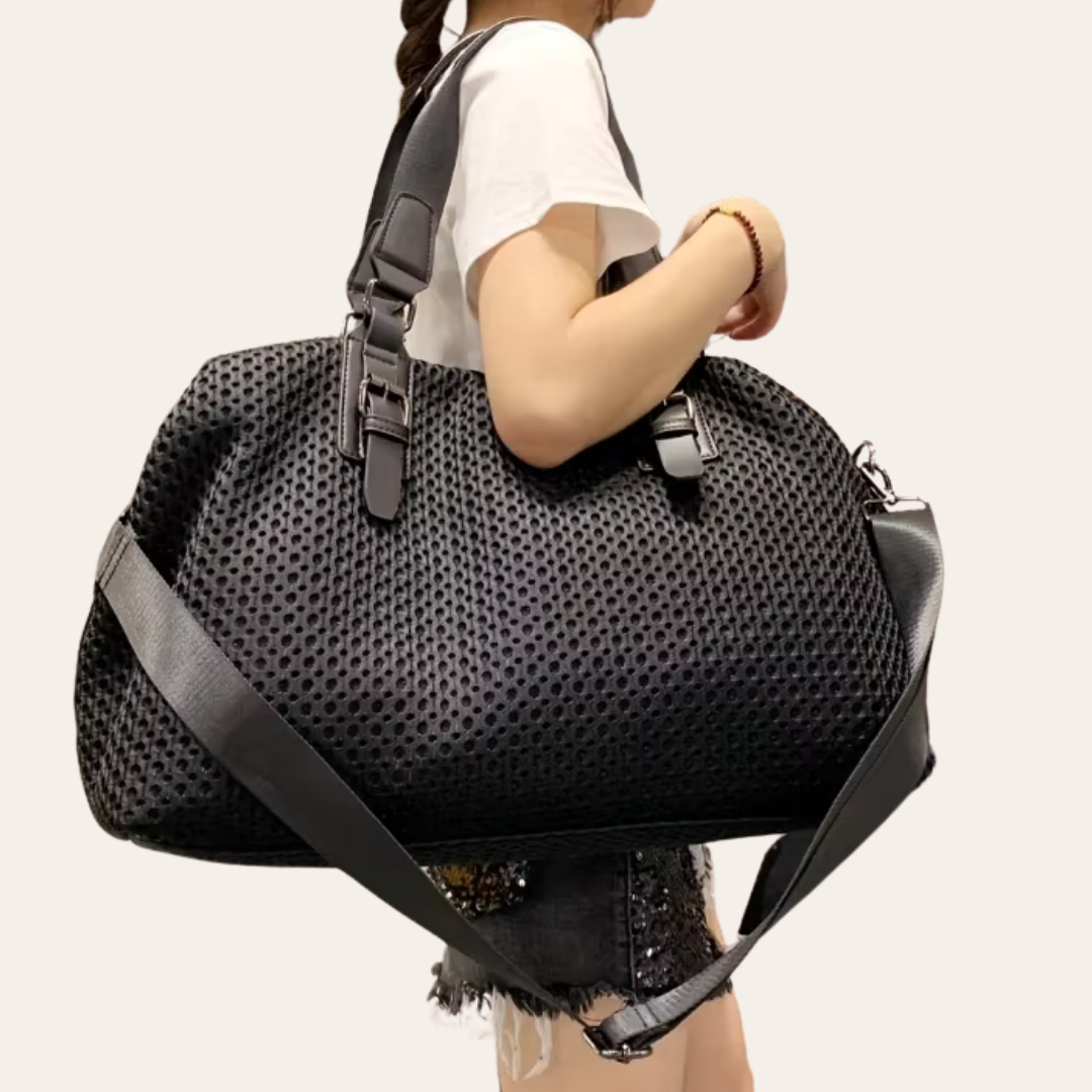 Grand sac a main femme noir cabine week end.