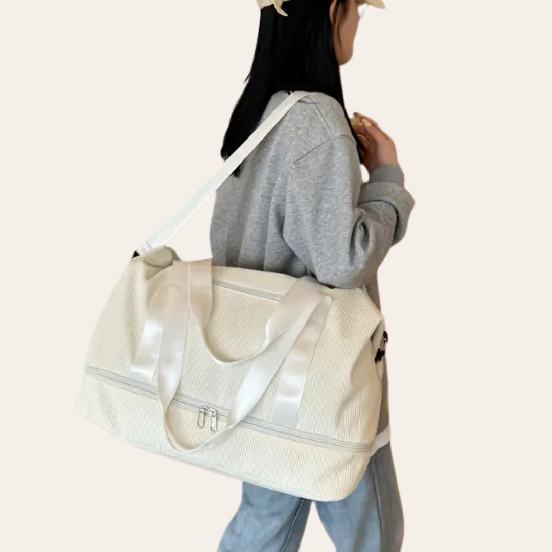 Sac a main a bandoulière en velour cabine week end femme.