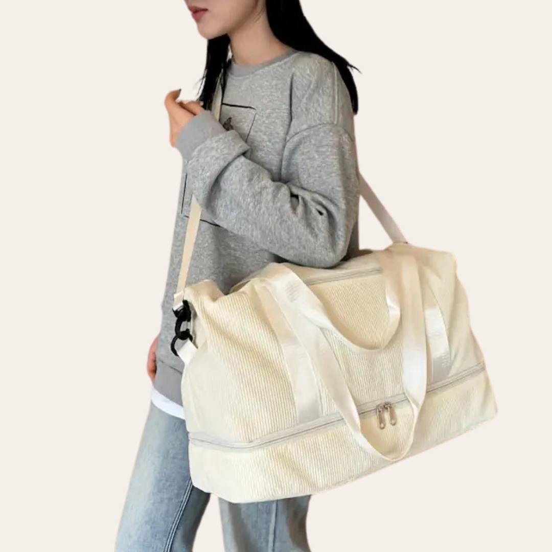Sac a main a bandoulière en velour cabine week end femme.