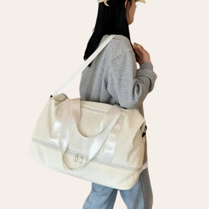 Sac a main a bandoulière en velour cabine week end femme.