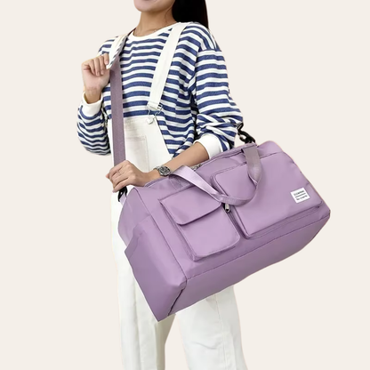 Bandouliere sac a main de voyage femme.